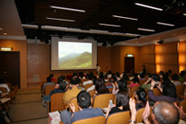 Prof Cheung spoke with enthusiasm in front of a full audience.