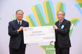 Mr Richard KAN, representative of In Yam Development Limited presenting cheque to Prof LEE Chack-fan, SBS, JP