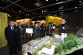 Mrs Carrie LAM CHENG Yuet-ngor, GBS, JP and other guests viewing the model of Taikoolau